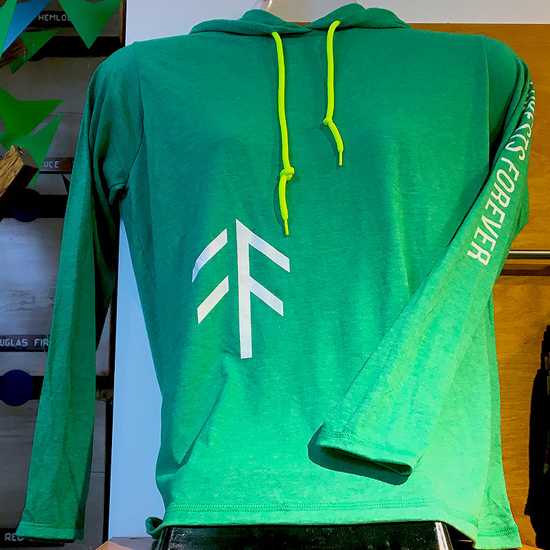 Our Forests Forever Green Long Sleeved Hoodie Tee Shirt is one of our more popular clothing pieces. Machine washable 60% Polyester / 40% Cotton.  Available in Women's and Men's sizes. Women's style is slightly tapered in the waist for a flattering look. Men's sizing up to 2XL.